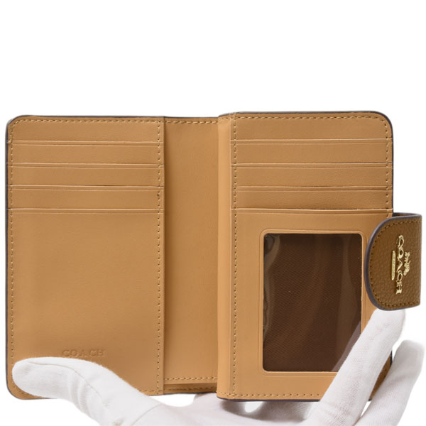 コーチ 財布 レディー スヌーピー コンパクト 2つ折り財布 PEANUTS コラボ レザー ホワイト×ブラウン COACH 中古