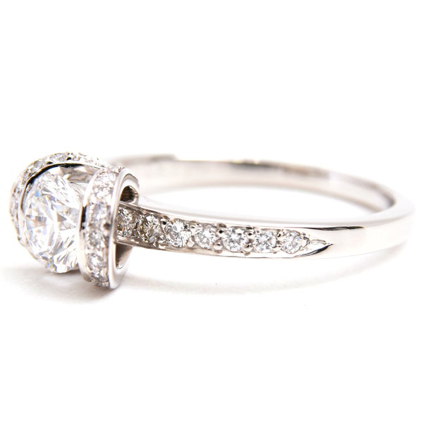 ティファニー リング レディース リボン モチーフ ダイヤ リング 0.6ct程度 15号強 プラチナ TIFFAN PT950 中古