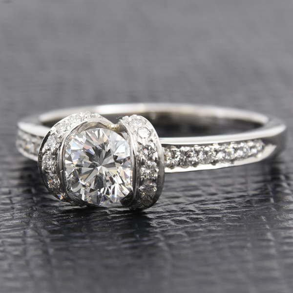 ティファニー リング レディース リボン モチーフ ダイヤ リング 0.6ct程度 15号強 プラチナ TIFFAN PT950 中古