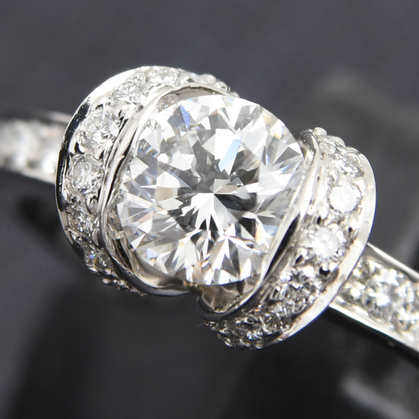 ティファニー リング レディース リボン モチーフ ダイヤ リング 0.6ct程度 15号強 プラチナ TIFFAN PT950 中古